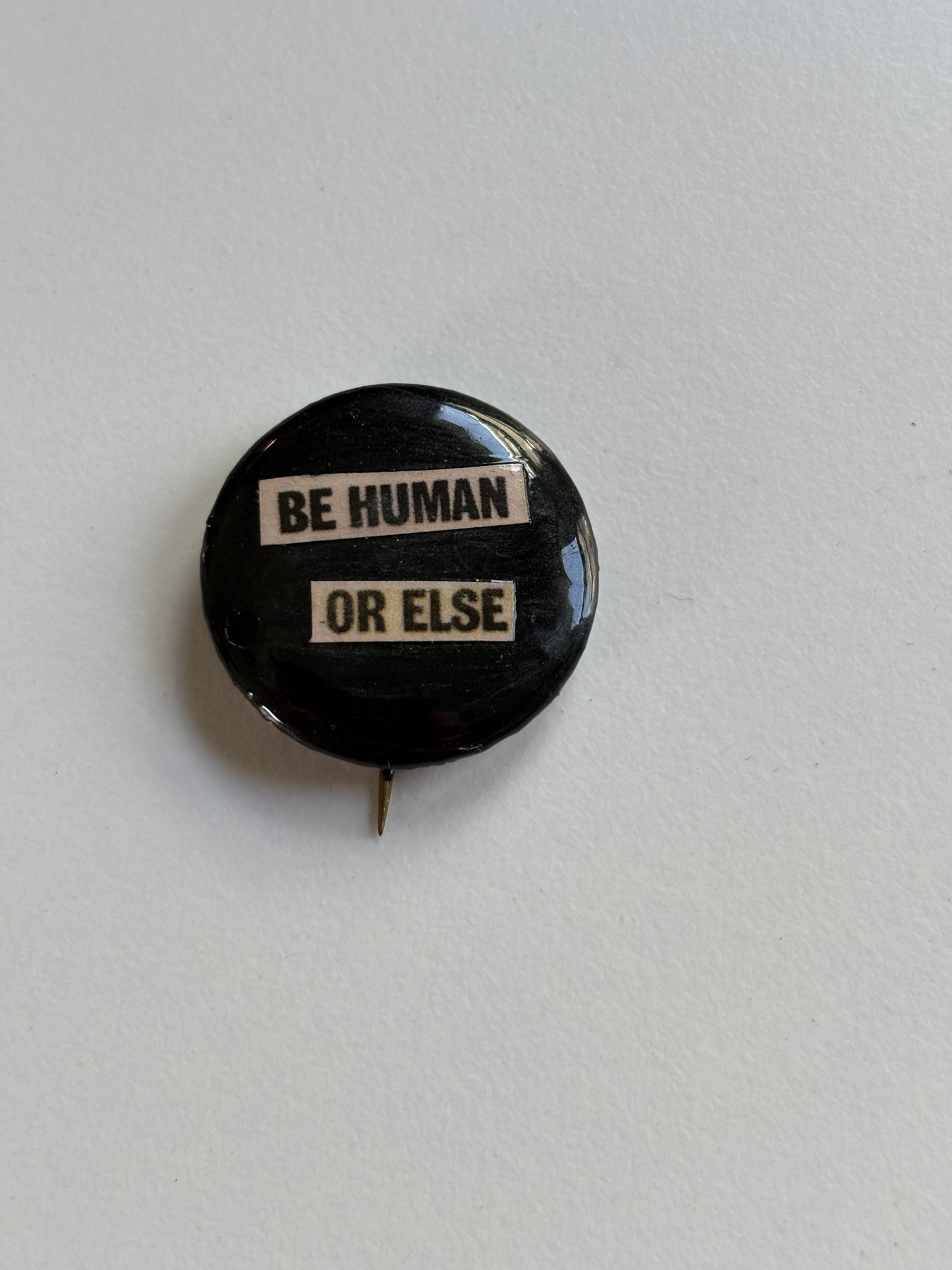 Ex Politician Button “Be human or else” 1”