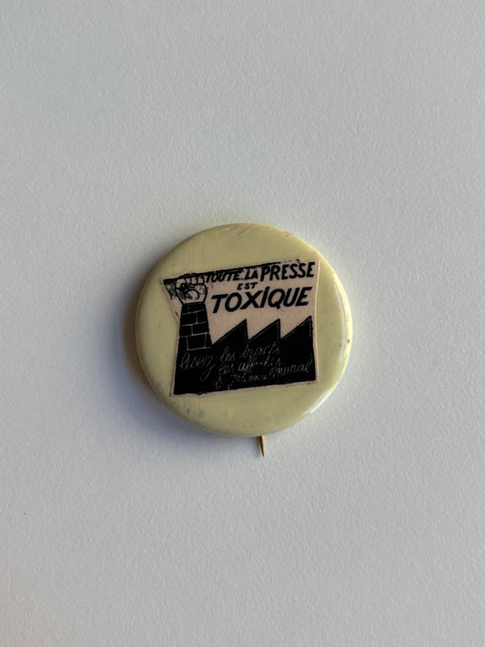 Ex Politician Button Atelier Populaire “Toxique” 1.75”